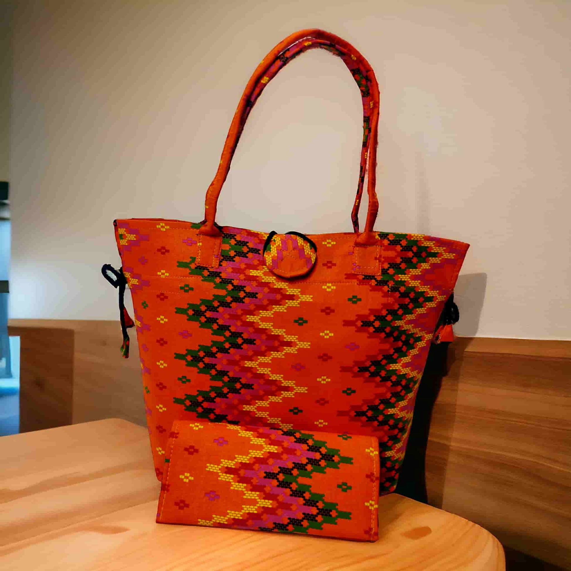 Orange colour printed thamibag with macthing purse